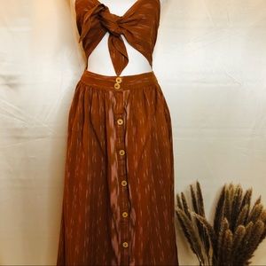 Rust colored tie front midi-dress.